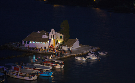 Evening scene of Vlacherna monastery and Pontikonisi island, Kanoni, Corfu, Greeceの写真素材
