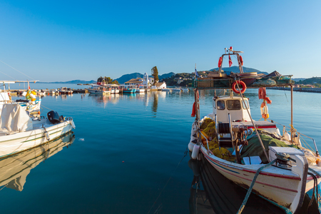 Boats in small harbor near Vlacherna monastery, Kanoni, Corfu, Greeceの写真素材