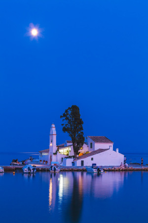 Night full moon scene of Vlacherna monastery near Kanoni, Corfuの写真素材
