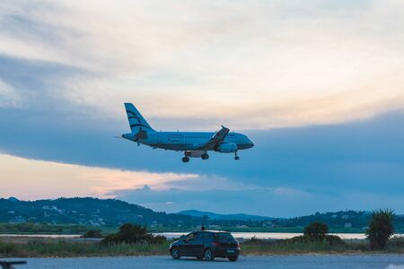 CORFU AIRPORT, GREECE - JUNE 30, 2011: Airbus A319 of Aegean company at the airport Corfuのeditorial素材