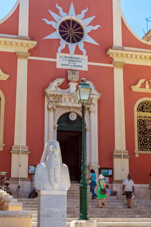 CORFU, GREECE - JULY 7, 2011: Cathedral of St. Spiliotiss at Kapodistriou street and touristsのeditorial素材