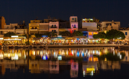 Agios Nikolaos City and Voulismeni Lake at Night  Crete, Greeceの写真素材