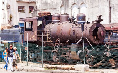 HAVANA, CUBA - APRIL 2, 2012: Tourists walking near outdoor exposition of Railway Museum (Museo del Ferrocarril)のeditorial素材