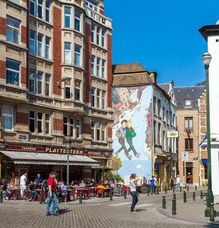BRUSSELS, BELGIUM - APRIL 5, 2008: Wall graffiti characters of the comic and Plattesteen restaurant on the streets of the old cityのeditorial素材