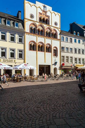 TRIER, GERMANY - APRIL 7, 2008:  Tourists walk along Simeon strasse, main shopping street of cityのeditorial素材