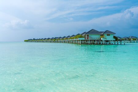 Many ocean bungalows built over water, Maldives