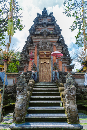 UBUD, INDONESIA - AUGUST 29, 2008: Ancient hindu temple with stone carvingのeditorial素材