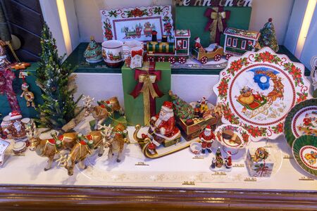 Obberamergau, Germany - October 15, 2017: Traditional porcelain christmas figures in window of souvenir shopのeditorial素材