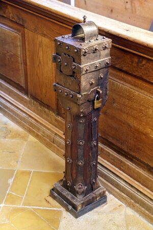 Obberamergau, Germany - October 15, 2017: Ancient box for donation in cathedral interiorのeditorial素材