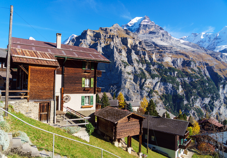 Traditional Chalets of Murren village and Jungfrau montain at autumn, Berner Oberland, Switzerlandのeditorial素材