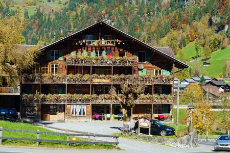 Lauterbrunnen, Switzerland - October 17, 2017: Traditional Chalet house in Berner Oberland village