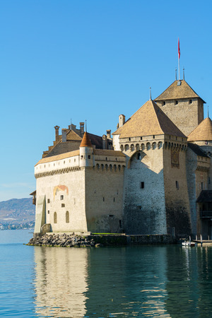 Chillon Castle on Lake Geneva in Alps mountains at autumn, Montreux, Switzerlandのeditorial素材