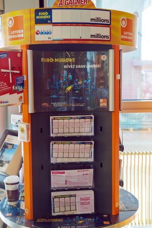 Geneva, Switzerland - October 18, 2017: Rack with tickets and advertising of the Swiss version of the lottery Euromillionsのeditorial素材
