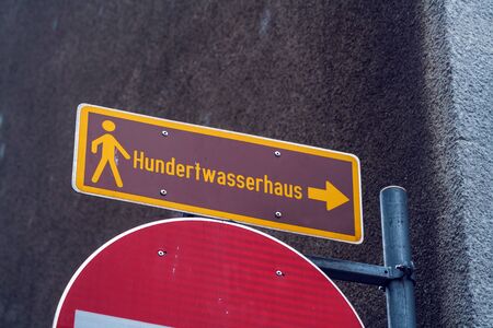 Vienna, Austria - October 22, 2017: Street pointer to the city's landmarks - Hundertwasser's houseのeditorial素材