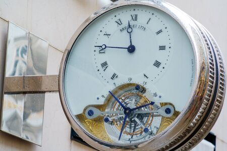 Vienna, Austria - October 22, 2017: Advertising sign in the form of clock Breguet on the wall of the storeのeditorial素材