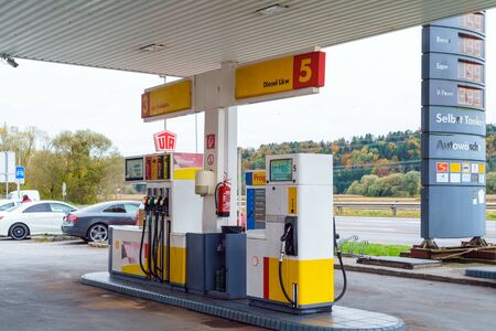 Graz, Austria - October 23, 2017: Refueling Shell with cars that came for gasoline