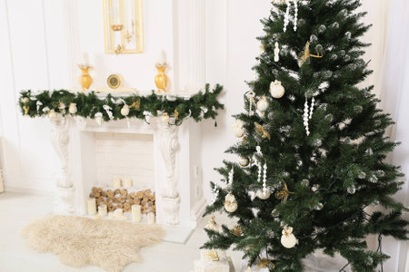 decorated chrismas room with a tree,fireplaceの写真素材