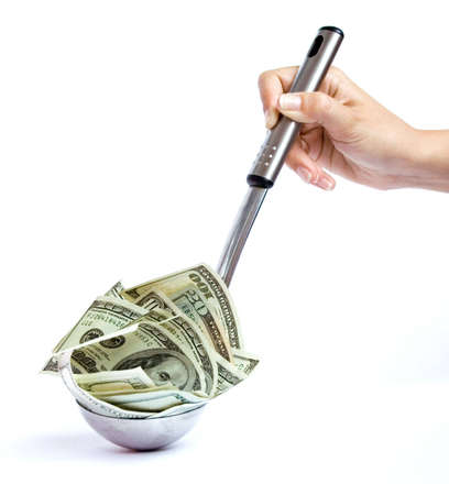 A symbolic image of money is in a spoon.