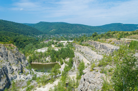 Panorama of abandoned and flooded quarry. Beautiful summer landscape in Adygeya respublic in Russia.の写真素材