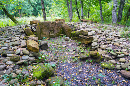 The stones of the destroyed ancient dolmen in Adygea in southern Russiaの写真素材