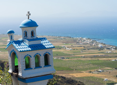 A small model of church on the seaside. Santorini Island, Greece.の写真素材
