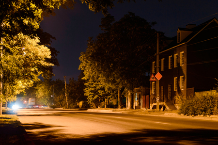 Night scene of small old town with street lights.の写真素材