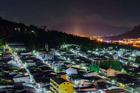 View from high building see to Amphoe Kathu district in night time, Phuket Thailandの写真素材
