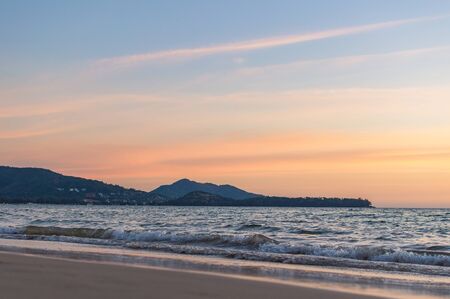 Sunset, Wave motion beach scene. Long exposure of the wave during Sunrise on the beach. Image may contain soft focus and blur due to long exposure. Selective focus.の写真素材