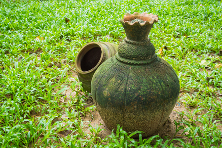 Garden decor. Moss on ancient pottery potの写真素材