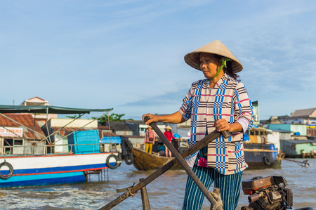 Can Tho, Vietnam, December 30, 2016: Unidentified woman at floating market in Mekong river delta, is one of biggest floating markets on Mekong Delta.のeditorial素材