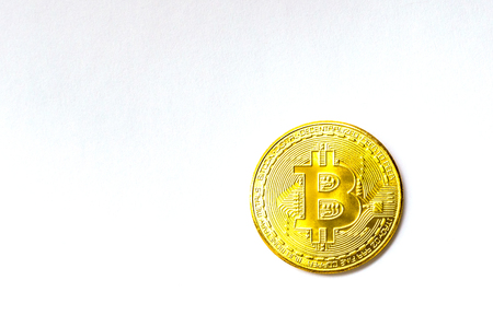 Golden bitcoin on white background. Concept mining. Copyspaceの写真素材