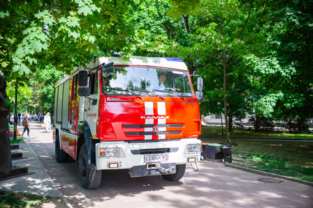 Rostov-on-Don, Russia - May 18, 2018: City Fire truck moving in downtown park.のeditorial素材