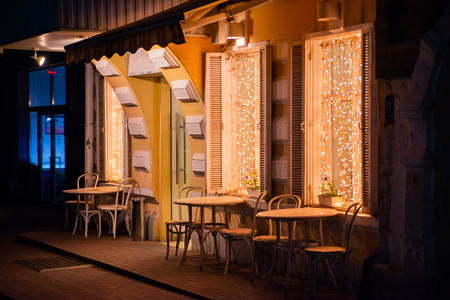 Outdoor cozy summer cafe in the evening.の写真素材