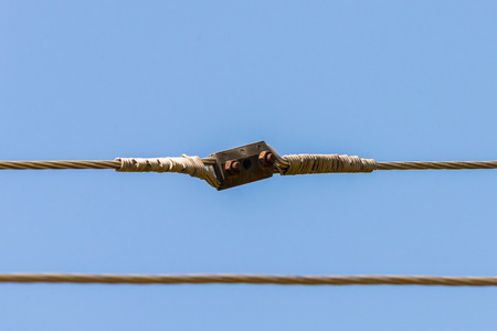 High-voltage connector electric wire system. Blue sky background