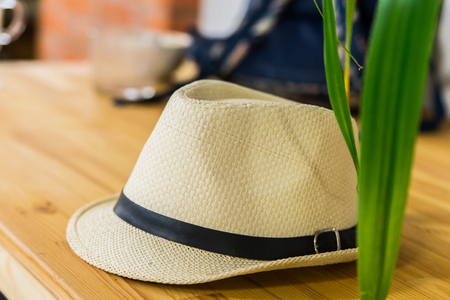 Fedora hat on wooden table. Hipsters and stylish concept.の写真素材