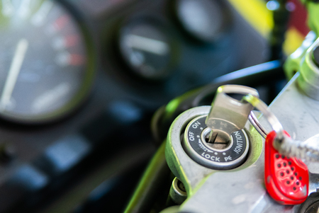 Close up Motorbike Key in the Key hole,Off on switch.の写真素材