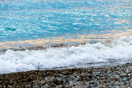 Seashore on stone beach. Close up viewの写真素材