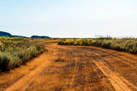 Rural dirt road landscape in steppe or desert