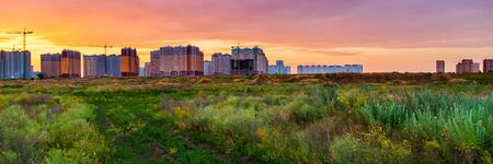 Natural background with condominiums, apartments, offices, shopping malls are blown through all the...