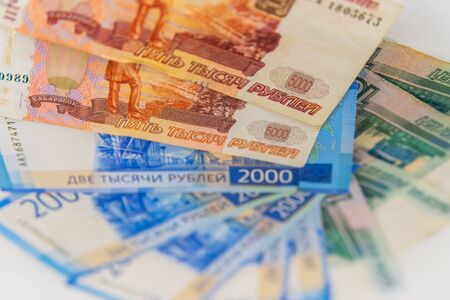 Scattered rubles currency banknotes, money closeup view.