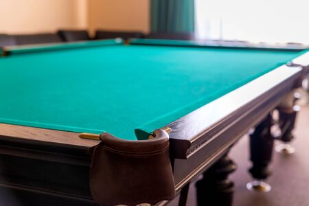 Pit of corner table snooker. Hole on billiard table.