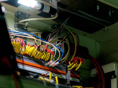 Automatic electrical connectors in power lines located inside of an industrial switch control panel...