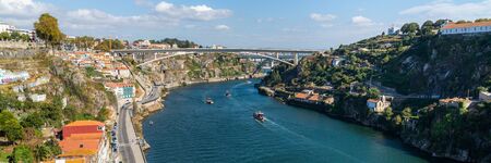 Prince Henry Bridge or Ponte do Infante D. Henrique over Douro Rive between cities of Porto and Vila...