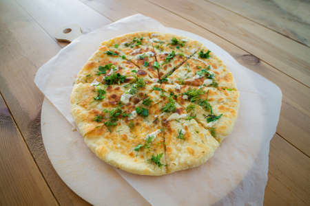 Close up pile of Caucasian khychin bread pie with stuffing.の写真素材