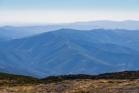 Wonderful aerial landscape in mountain. Blue smoke and skyの写真素材