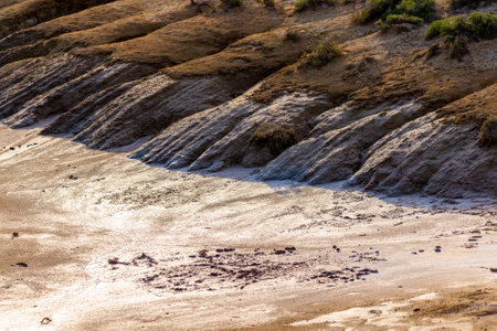 Ecological catastrophy. View on drying coast. Severe drought, the lake is dying without water.の写真素材
