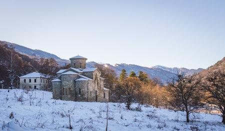 North Caucasus. Lower-Arkhyz settlement. Abandoned orthodox temple. Winter landscapeの写真素材