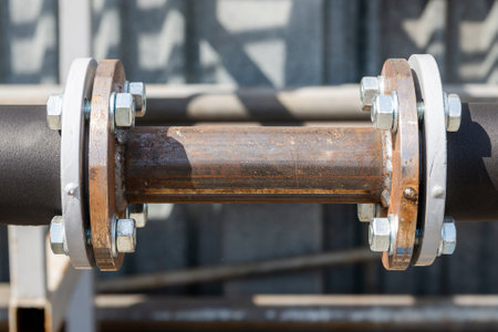 Metal pipe with flanges. Connection of pipe with flanges and welding.の写真素材