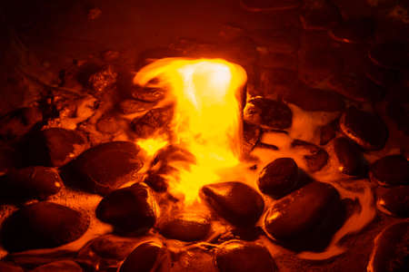 Spring of fire water. Burning methane in water. Cold fire.の写真素材