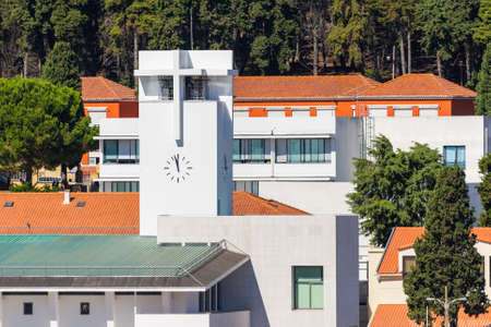 Modern clock tower and city architecture. Residential areaの写真素材
